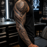 Neo-tribal tattoo sleeve blending traditional tribal patterns
